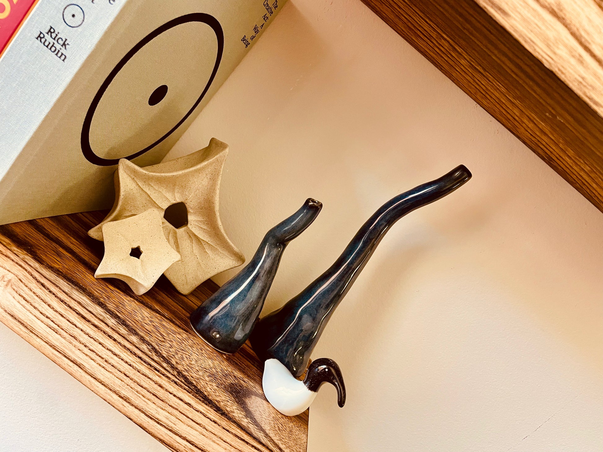 Twisted vase showcased on a shelf, emphasising its unique design and the way it can add a creative twist to any room's decor, blending artistic flair with functional elegance.